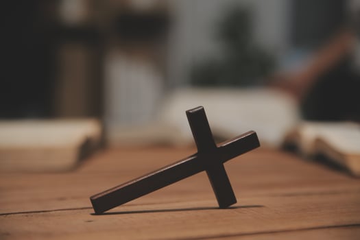 Christian group are praying to god with the bible and sharing the gospel. Concept of faith for god. photo