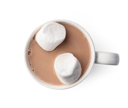 Top view of cocoa drink with marshmallow isolated on white photo