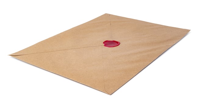 Recycled craft paper envelope isolated white background photo