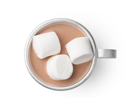Top view of cocoa drink with marshmallow isolated on white photo
