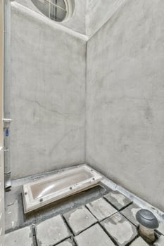 A bathroom with a tub and a shower photo