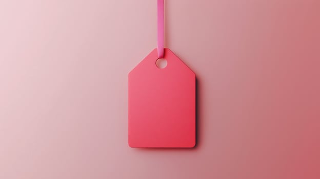 Paper price tag label red brand name with rope on solid background photo