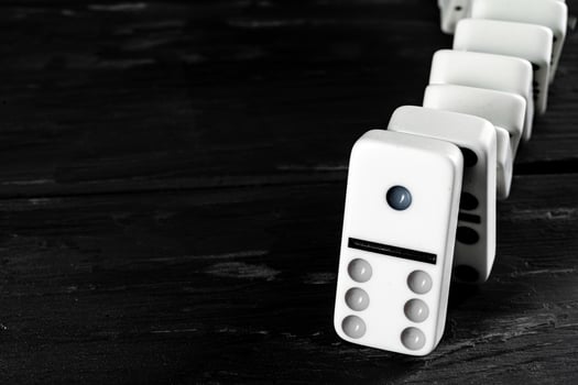 Domino game. Dominoes on a black table photo