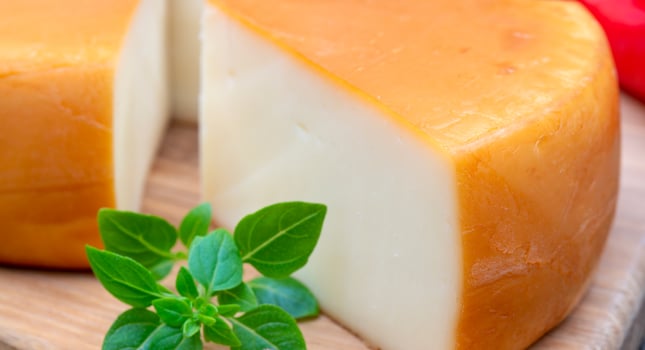 Fresh, round cheese. photo