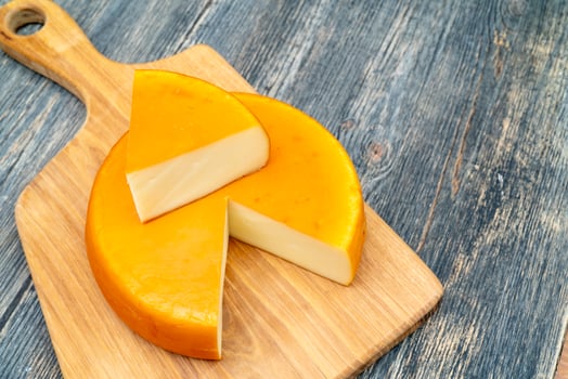 Fresh, round cheese. photo