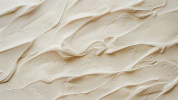 A close up of a white frosting with swirls photo