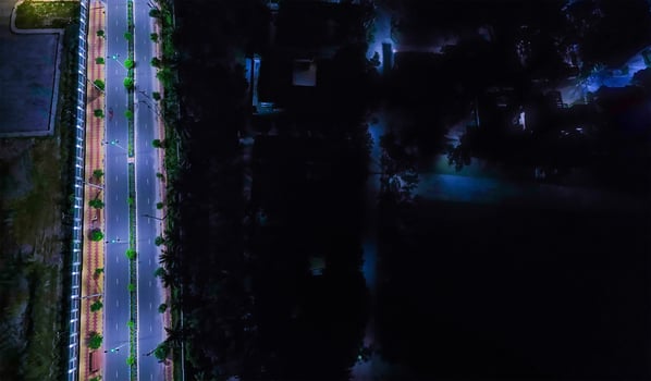 An aerial view of a road at night photo