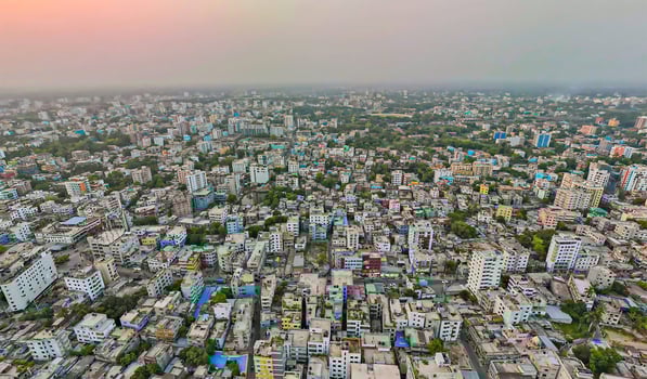 An aerial view of a city with lots of buildings photo