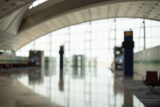 Empty the terminal at the airport boarding gate. airport departure hall for travel and transportation concept. Blur background. photo