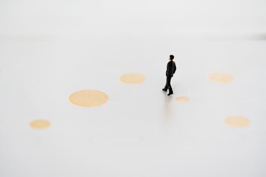 Miniature businessman walk to the direction. Business obstacle, financial, business growth concept photo