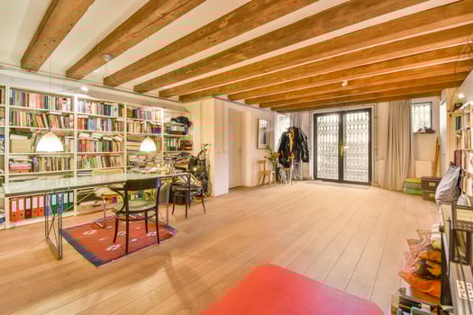 A room with bookshelves and a desk photo