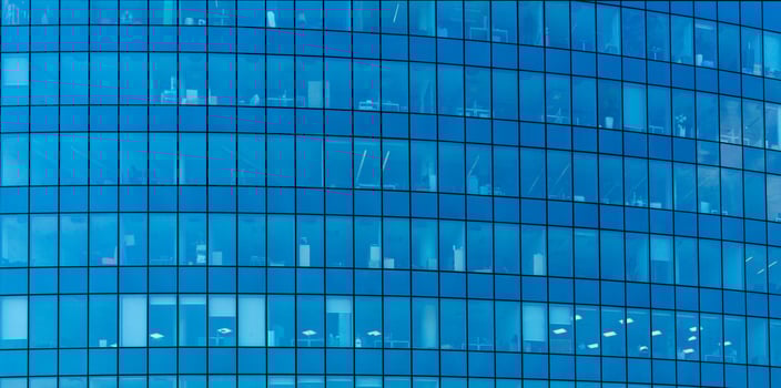 Glass windows of a modern building. Facade of an office building. photo