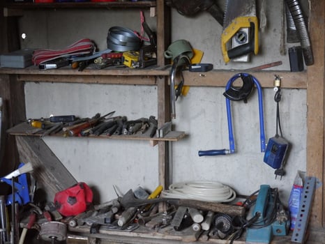 a collection of carpenter's tools in a village house photo