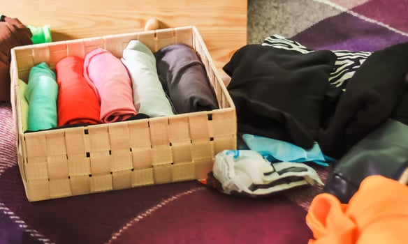 Sorting clothes for donation photo