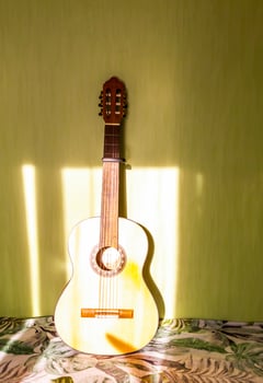 Classic guitar in the room interior. photo