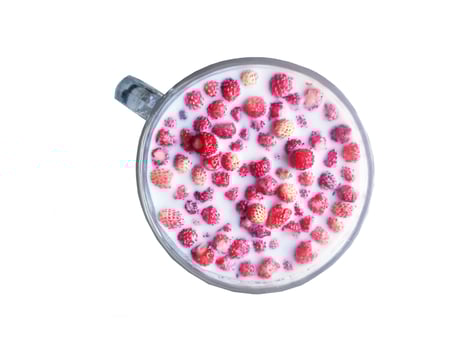 Fresh strawberries with milk in a cup photo
