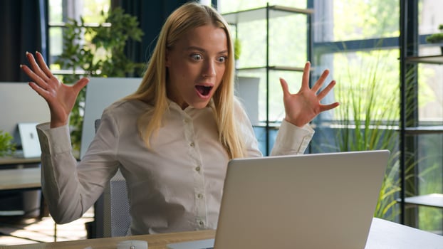 Amazed shocked Caucasian businesswoman excited girl woman winning offer read email on laptop amazing news wonder surprise female office manager win achievement clapping hands celebrating business deal photo