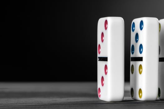 Domino game. Dominoes on a black table photo
