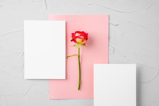 Top view of a pink paper letter and flowers with copy space photo