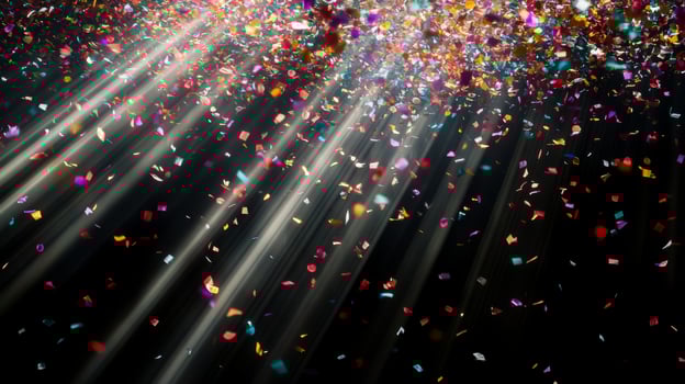 Multicolored confetti raining down against a black backdrop, with dramatic light rays streaming through the scene, casting shadows and reflections photo