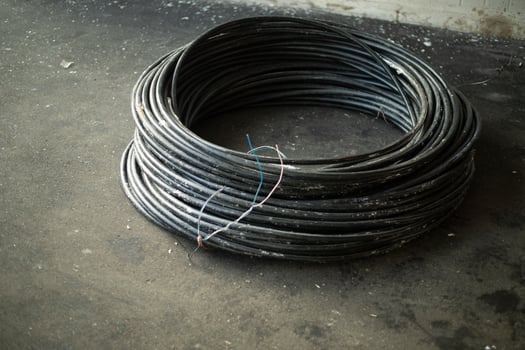 Rolled cable. Wire on the street. Repair work. photo