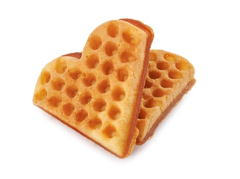 Heart shaped Viennese waffle isolated on white background. photo