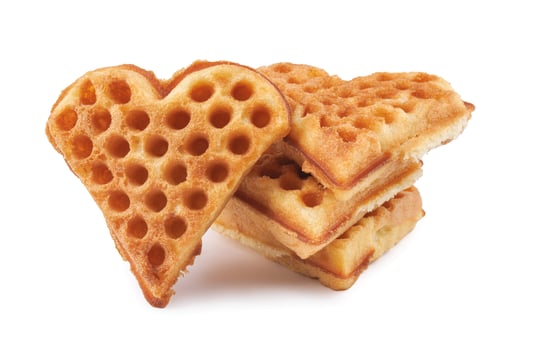 Heart shaped Viennese waffle on white background. photo