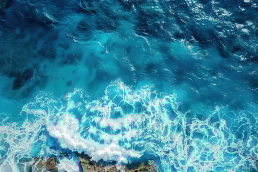 An aerial view of the ocean and waves photo