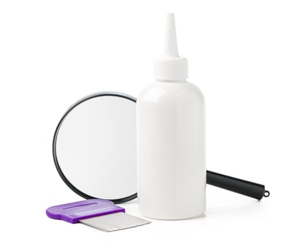Medicine, lice comb and magnifying glass isolated on white photo