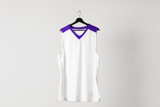 White basketball jersey hanging against white background photo