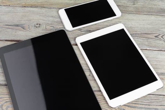 digital tablet and smartphone on the table photo