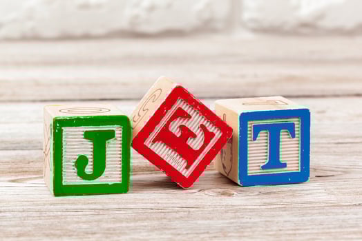 Wooden toy Blocks with the text. jet photo