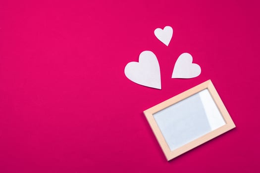 Flying red paper hearts. Valentine's Day. Symbol of love. Copy space. photo