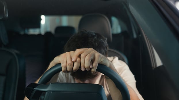 Frustrated stressed worried irritated angry Caucasian driver worry about traffic jam lateness business failure relationship breakup auto broken lost man problem sit in car automobile driving trouble photo