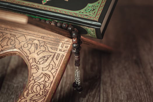 The holy book of the Koran on the stand photo