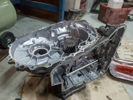 automatic transmission housing being dismantled, car transmission photo