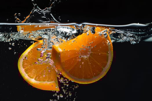 A slice of orange in water photo