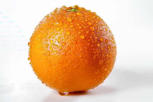 A water droplet on an orange photo