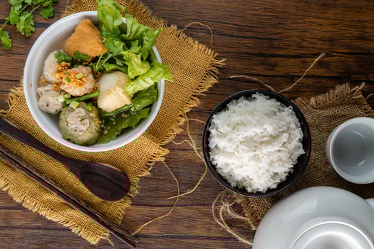 Yong tau foo , yong tau fu or Liong Tahu. is a Hakka Chinese cuisine consisting primarily of tofu filled with ground meat mixture or fish paste. photo