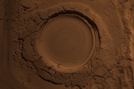 Close-Up of White Flour Texture, Surface with Dents, Cracks, and Imprints photo