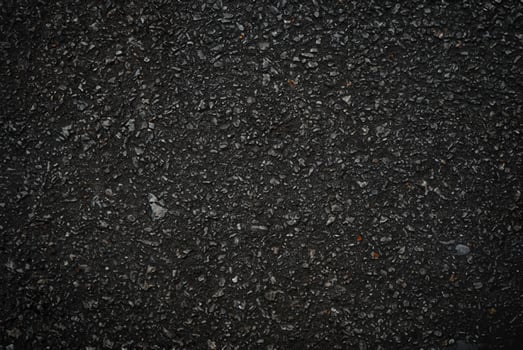 Close-Up of Asphalt Surface Texture photo