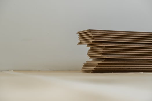 Laying laminate flooring in a home renovation project. Detailed image of wood photo
