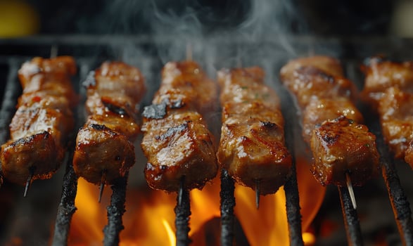 Close-up of perfectly grilled meat, caramelized edges and crispy fat glistening photo