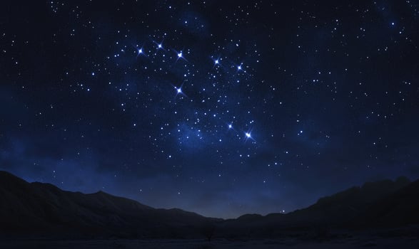 A starry night sky with a long line of stars photo