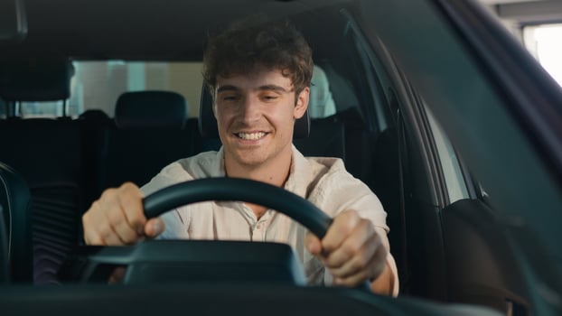 Caucasian business man driver male guy open door of new modern electric car sitting inside celebrate buying automobile hands gesture win winning success achieve smiling happy in rental rent auto buy photo