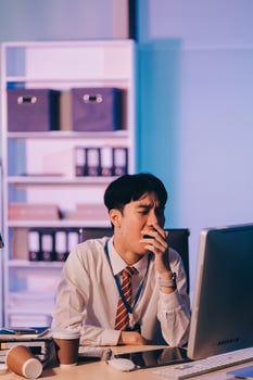 Businessman workaholic sit at the computer working late at night yawn tired and sleeping in the office,Hard work in the later time concept photo