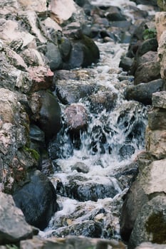 Flowing water on Bastion hill in Riga, Latvia, East Europe photo