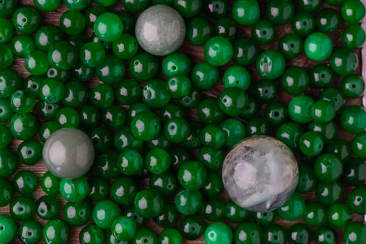 green beads made of real stone as a background photo