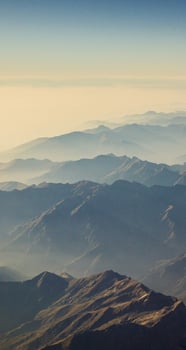 A view of the mountains from an airplane photo