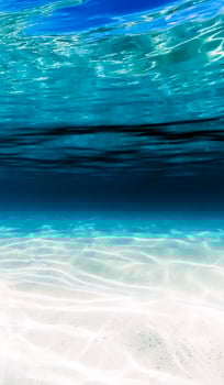 Underwater view of the beach and water photo
